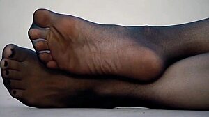 check out my wife's sexy feet in nylon pantyhose