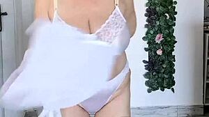 whoa, check out this busty granny shaking her huge tits in sexy lingerie dance!