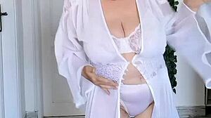 whoa, check out this busty granny shaking her huge tits in sexy lingerie dance!