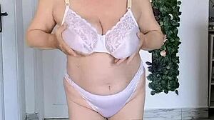 whoa, check out this busty granny shaking her huge tits in sexy lingerie dance!