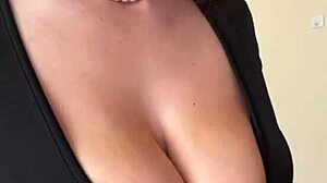 check out these big milky tits spilling from her black dress