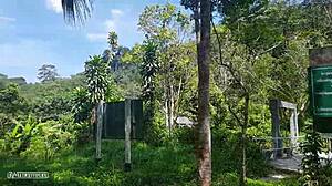 A naked girl poses wild in Amazon jungle