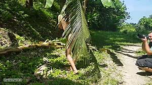 A naked girl poses wild in Amazon jungle