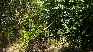 A naked girl poses wild in Amazon jungle