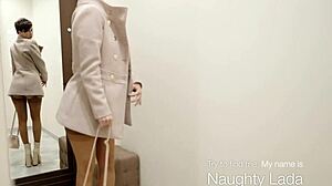 Nude milf flashes bare body under open coat