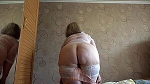 check out this mature bbw trying white panties while shaking huge ass??