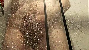 showering steamy monster cock load explosion closeup