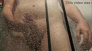 showering steamy monster cock load explosion closeup