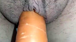 Gretala squirts hard masturbating with huge carrot orgasm