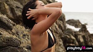 My skinny Canadian muse Kristie Taylor spreads naked legs and pussy on beach rocks