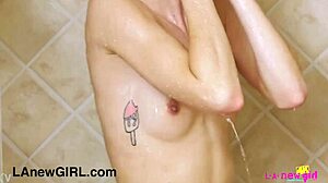 Skinny blonde teen strips in steamy shower photoshoot