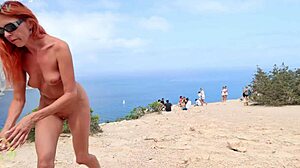 she flashes her shaved pussy naked on the beach and streets