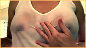wife flaunts her huge braless tits in wet singlet