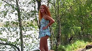 Stunning Redhead Teen Poses Naked Amid Forest Beauty