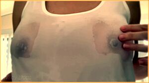 wife flaunts her huge braless tits in wet singlet