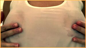 wife flaunts her huge braless tits in wet singlet