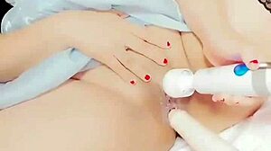 tiny chinese teen masturbates pussy on cock machine closeup