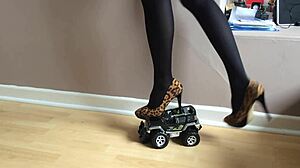 high heels crush toy car in garage play