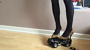 high heels crush toy car in garage play