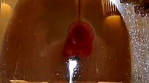 Juicy Ass Girl Fucks Pink Dildo In Dripping Shower