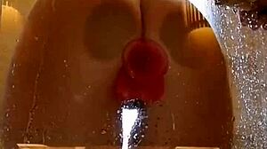 Juicy Ass Girl Fucks Pink Dildo In Dripping Shower