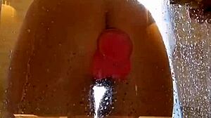 Juicy Ass Girl Fucks Pink Dildo In Dripping Shower