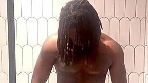 busty babe oils slick tits and ass in shower