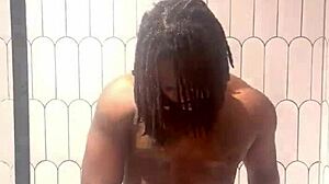 busty babe oils slick tits and ass in shower