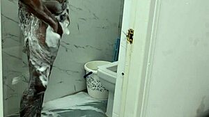 lucky asian boy showers with irani milf's huge tits and ass