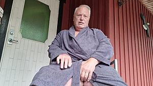 chris the old man gets shaved outdoors