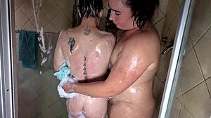 mature bbw licks young 18+ pussy lips in soapy shower leading to mutual orgasms