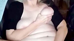 damn this hot milf rubs her big natural tits pussy till she cums
