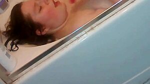 Gloria Plunges Dildo Deep In Bathtub Solo