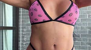 married babe tests her naughty sheer bikinis on the balcony view