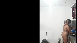 Cute Naked Latina Cooking Seductively in Kitchen