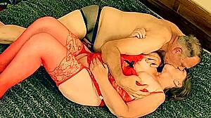Granny In Red Cums Hard On Bed Dildo