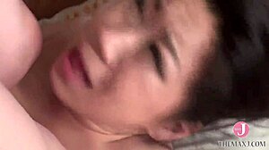 Japanese housewife's big tits bounce as old man roughly fucks her hips