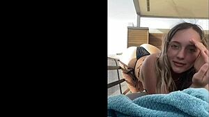 young blonde slips into bikini for steamy tease