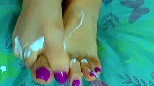 latina teen shoves glass dildo over painted toenails to wet orgasm