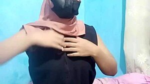 indonesian hijab girl dildo fucks to wet orgasm