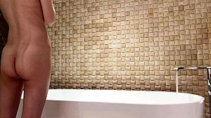 relaxing bath in luxury hotel room with slim beauty