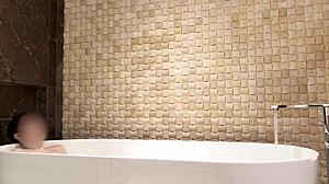 relaxing bath in luxury hotel room with slim beauty