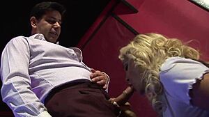 Bartender pisses on stripper Carmel Moore's fishnet ass and tits!