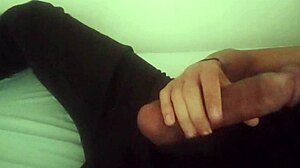 horny guy jerks massive cock in pants moaning to cum