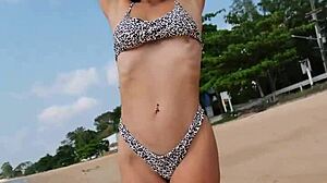petite 18+ in summer bikini waits for you on beach today