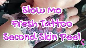 Tattooed Babe's Slow-Mo Peel Reveals Fresh Ink Fetish Thrill