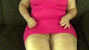 young cutie rubs her big clit and natural tits on sofa