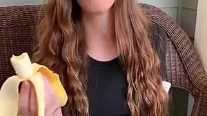 uhh ruiva's long hair sways as she sucks that banana deep mmm