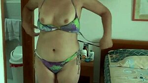 beautiful stepmom on beach flashes and fingers her excited pussy