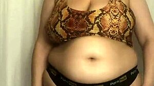 Chubby bbw tries on tight bikini bras squeezing big tits